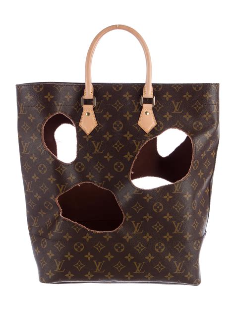 louis vuitton holes bag